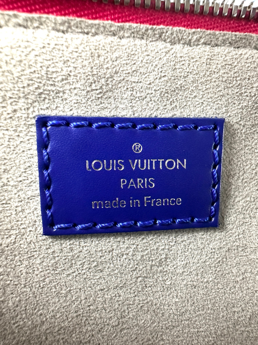 Louis Vuitton Epi Nano Alma Mini Bag in a Pink Blue and Fushsia Colorblock Pattern