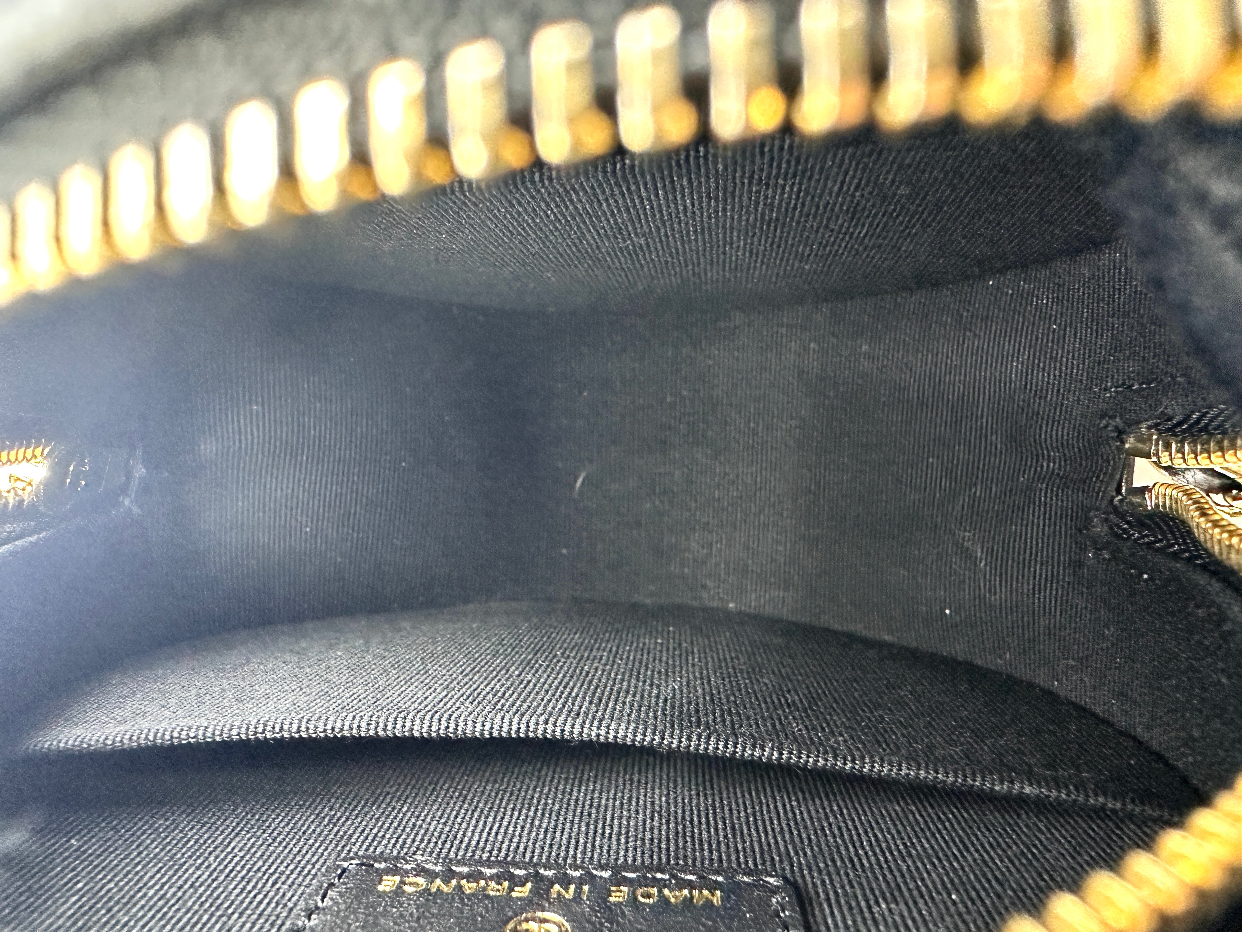 Chanel Quilted Bow Chain Round Clutch