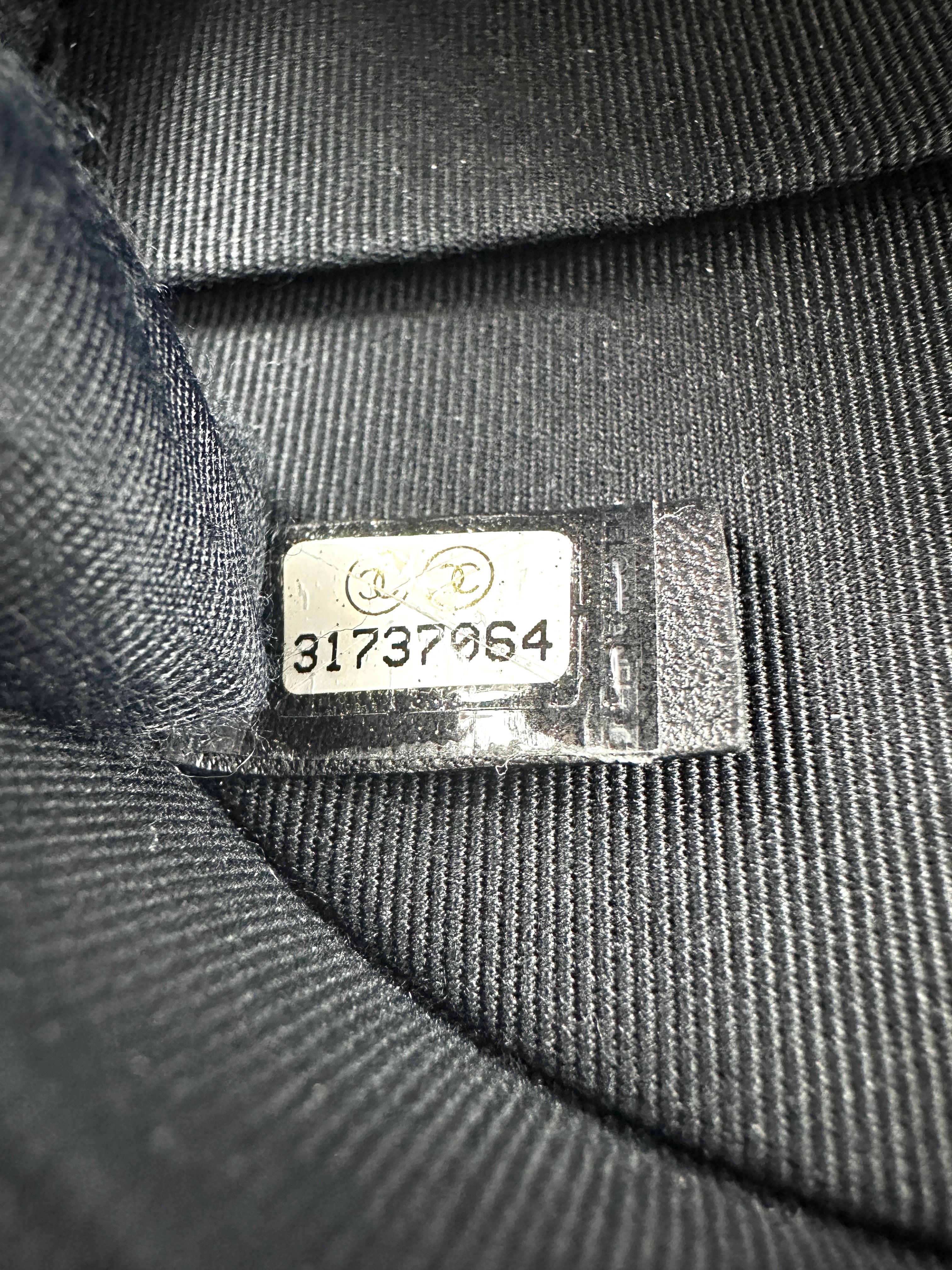 Chanel Quilted Bow Chain Round Clutch